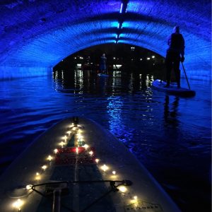 Colorful SUP adventure in the dark